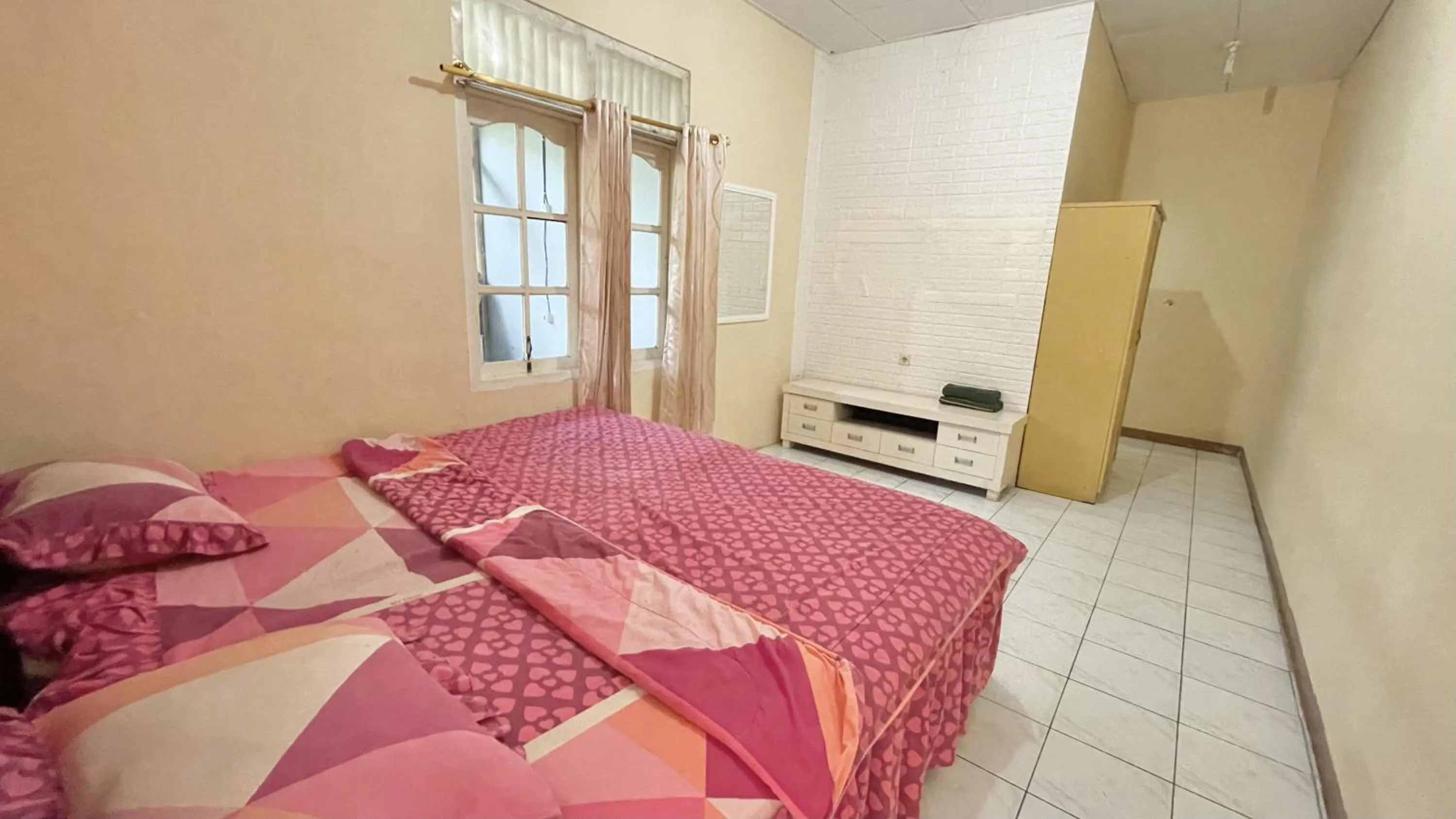 Bed in The Kanzi Hotel & Village