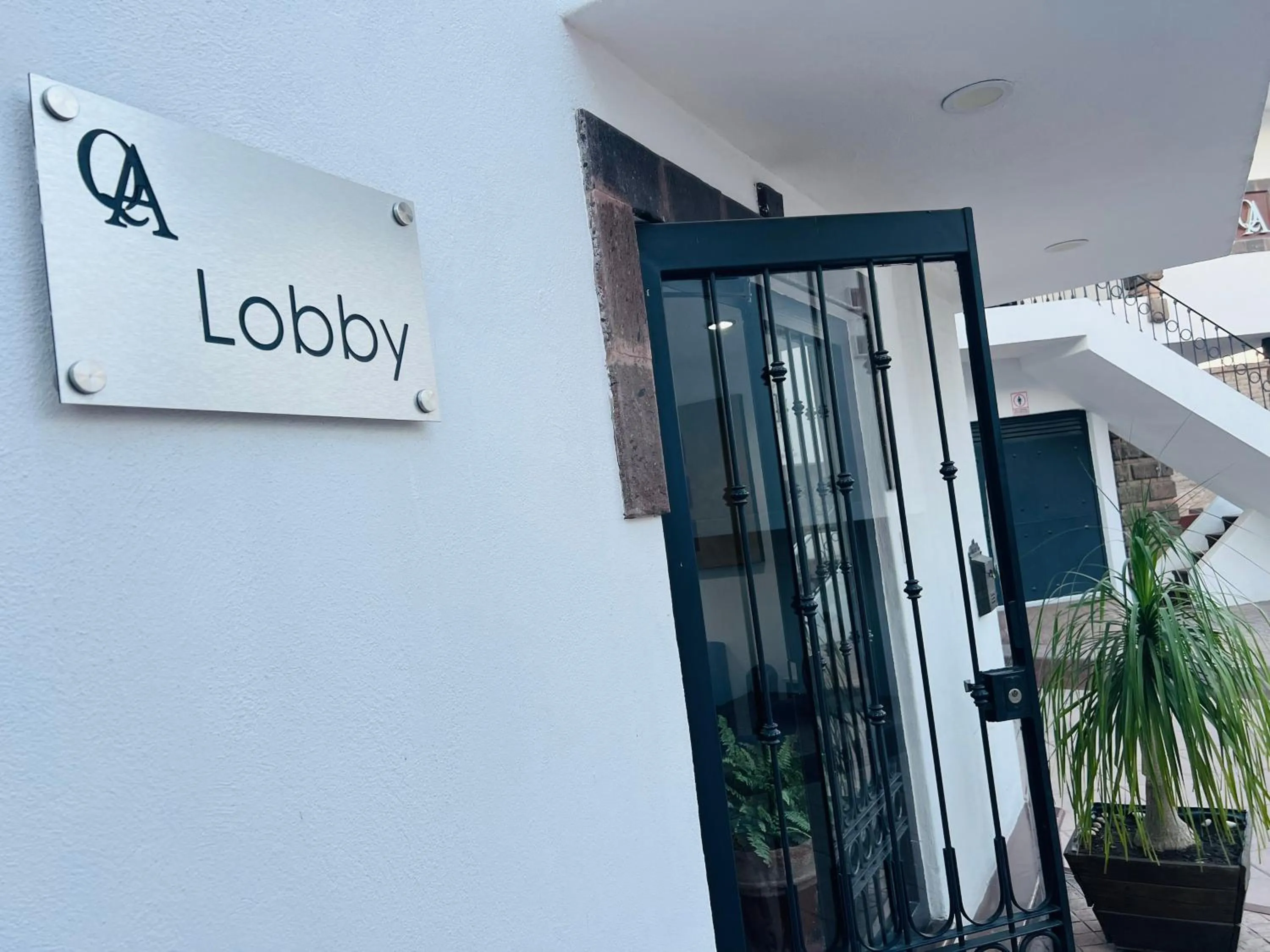 Lobby or reception in QA Hotel