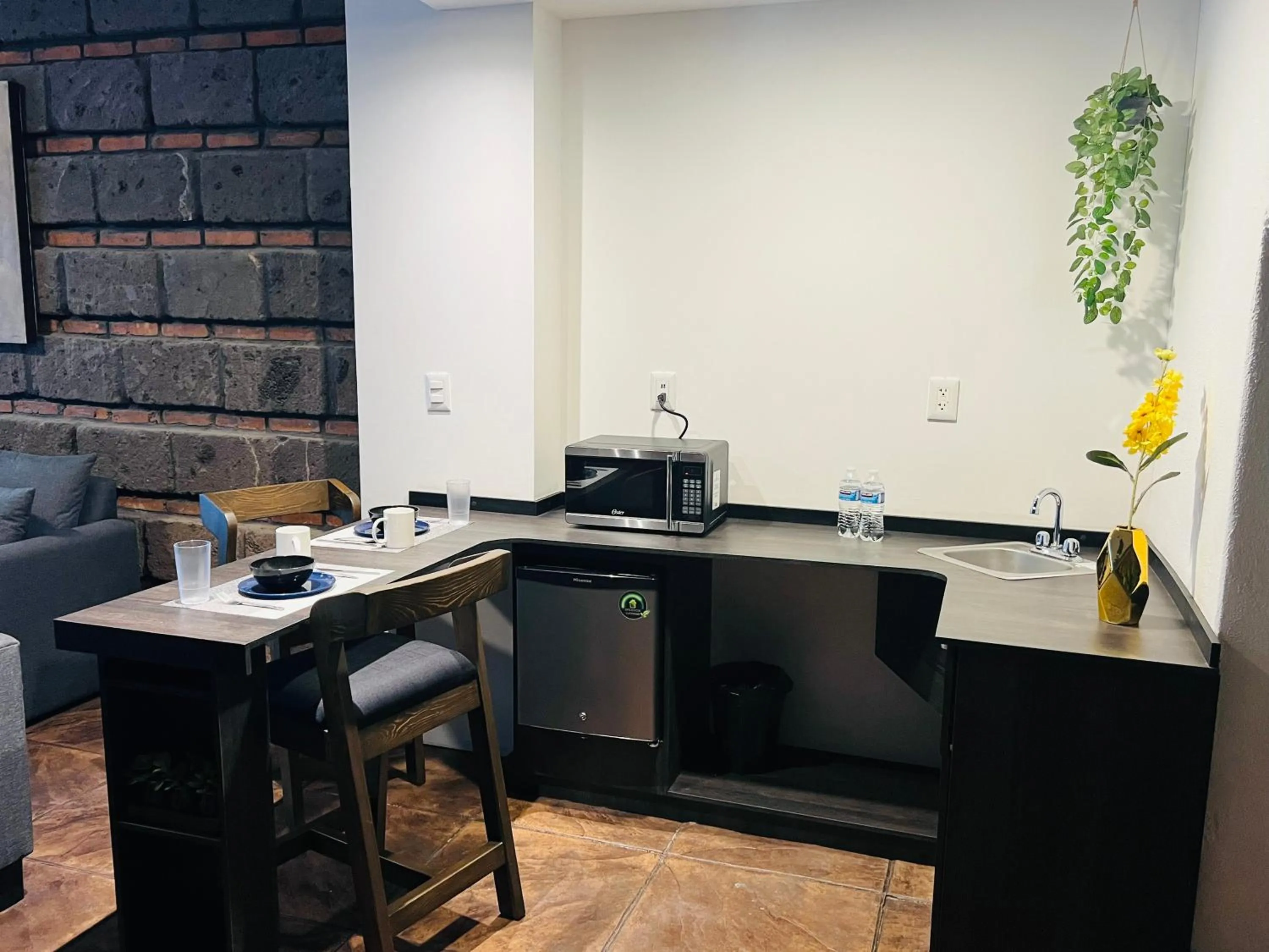 Kitchen or kitchenette in QA Hotel