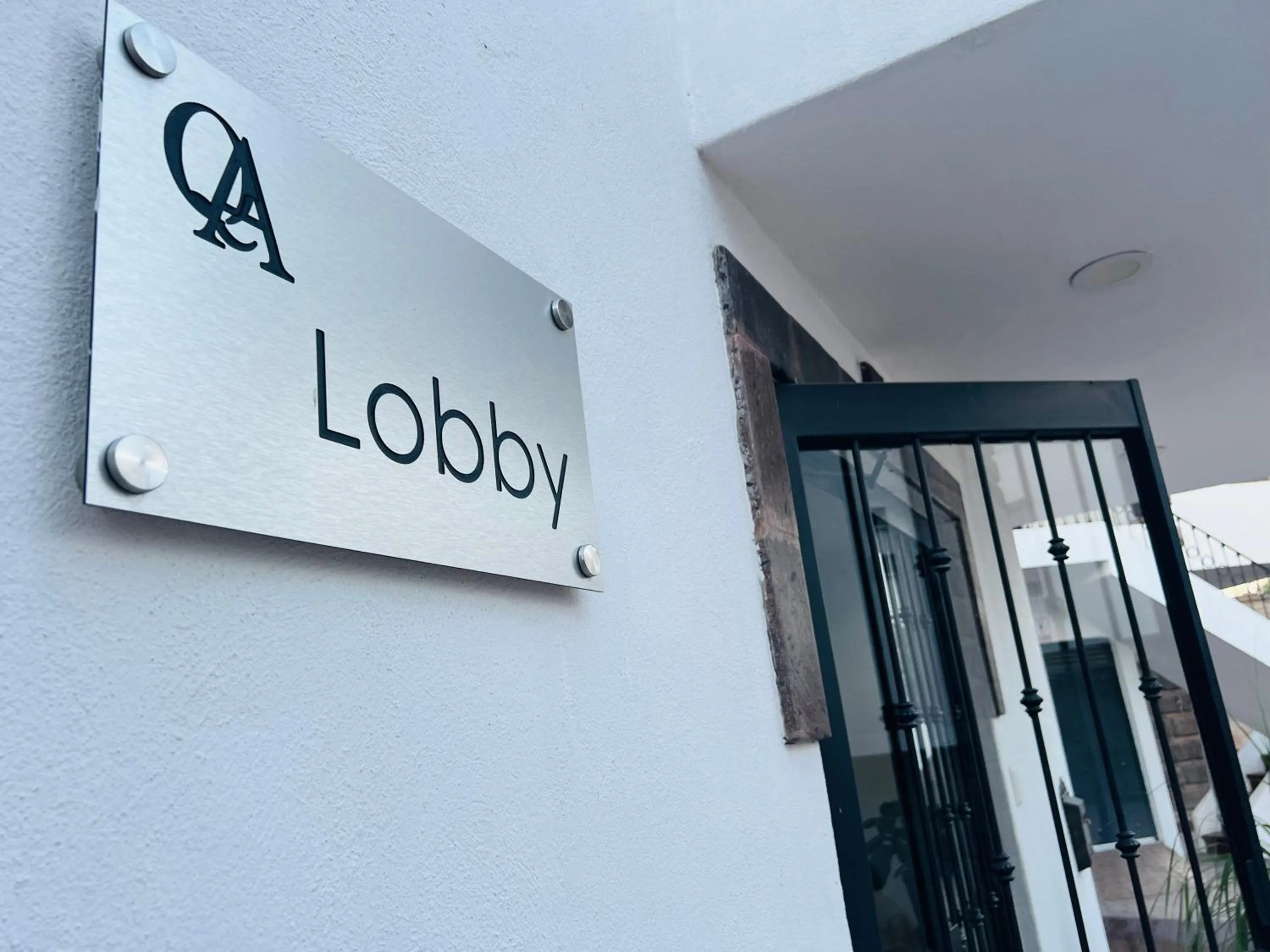 Lobby or reception in QA Hotel