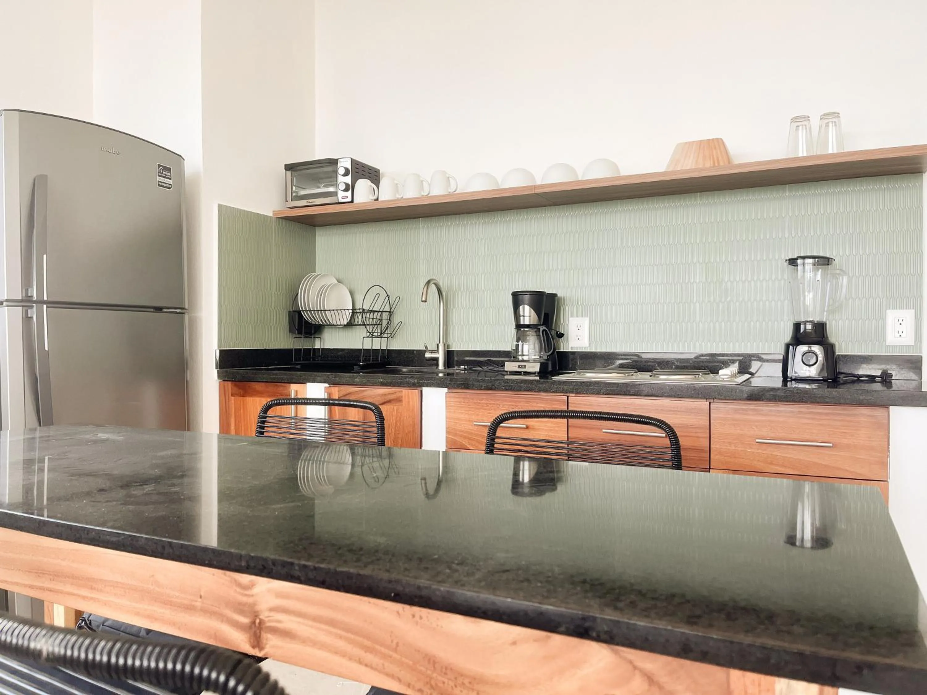 Kitchen or kitchenette in Itare Beach House