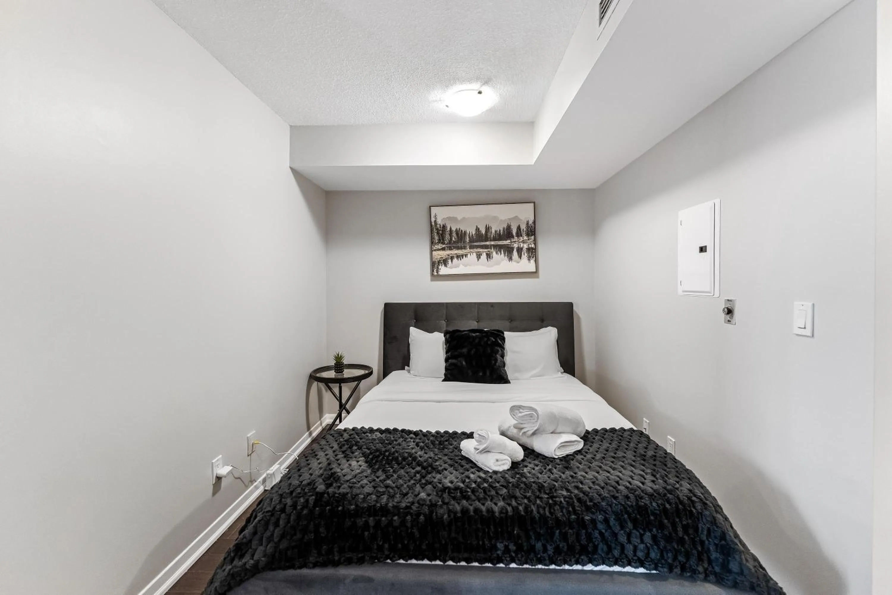 Bed in The Neptune I Suites