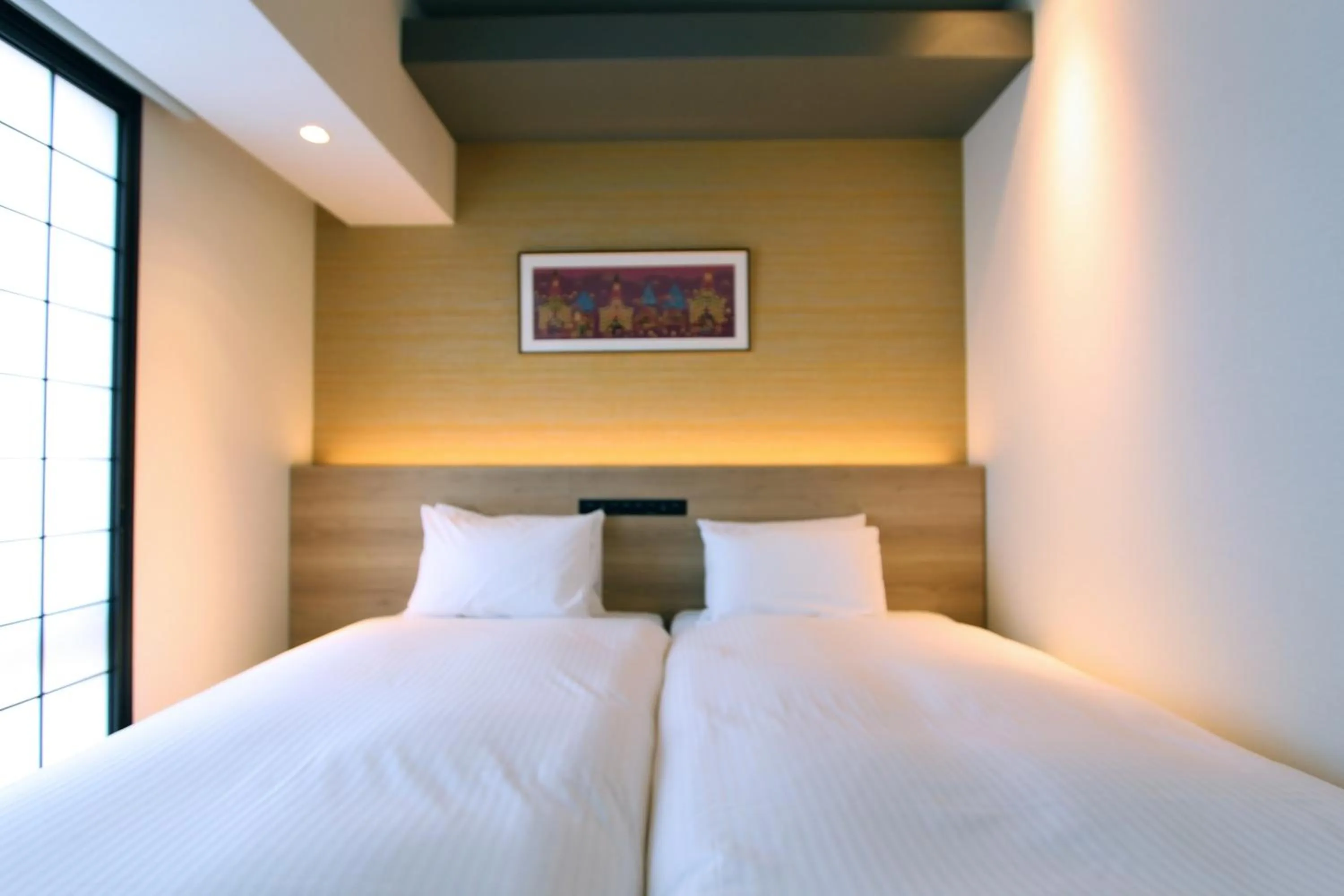 Bed in KOKO HOTEL Residence Kyoto Nijo Castle