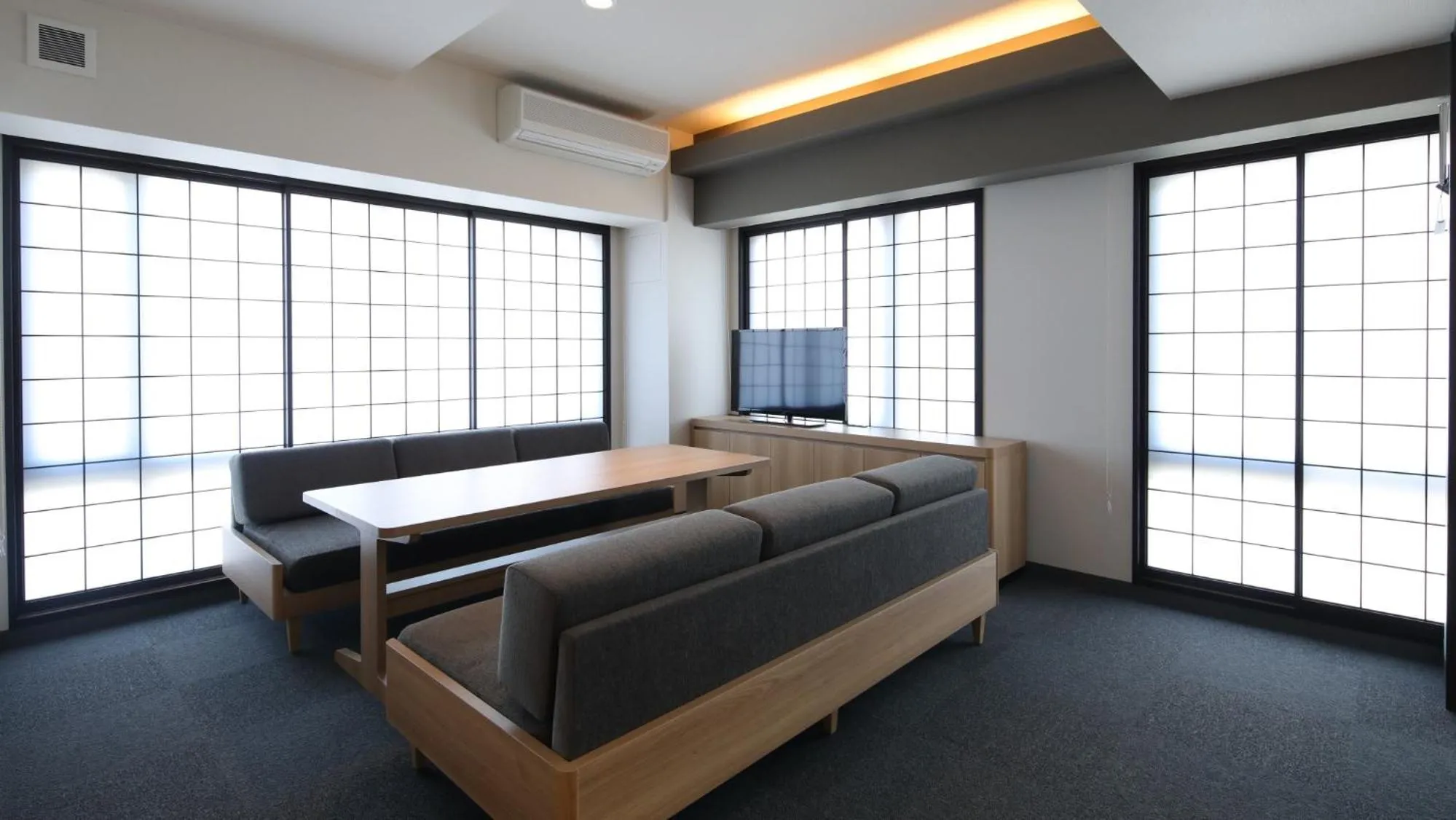 Living room, Bed in KOKO HOTEL Residence Kyoto Nijo Castle