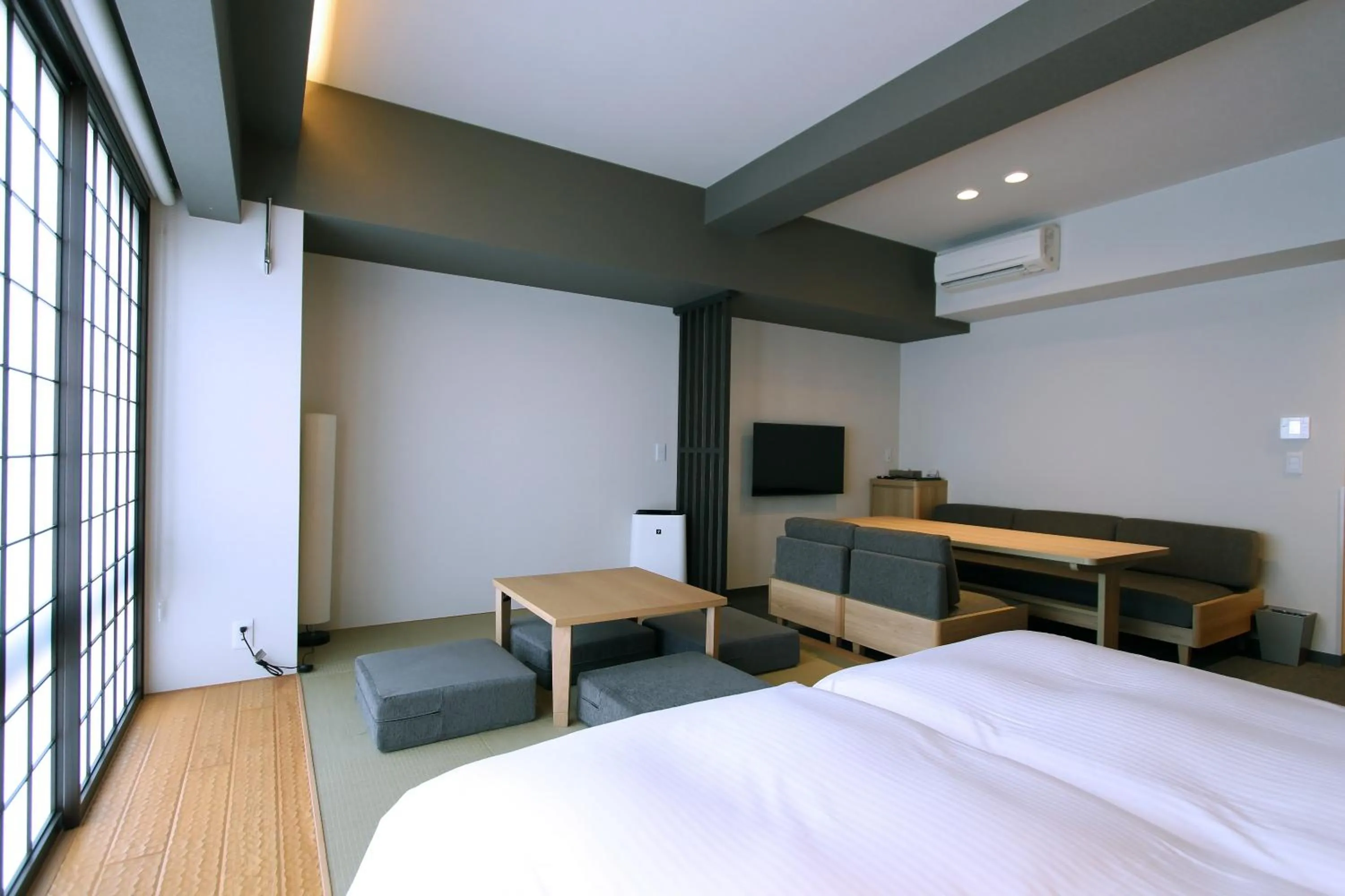 Photo of the whole room, Bed in KOKO HOTEL Residence Kyoto Nijo Castle