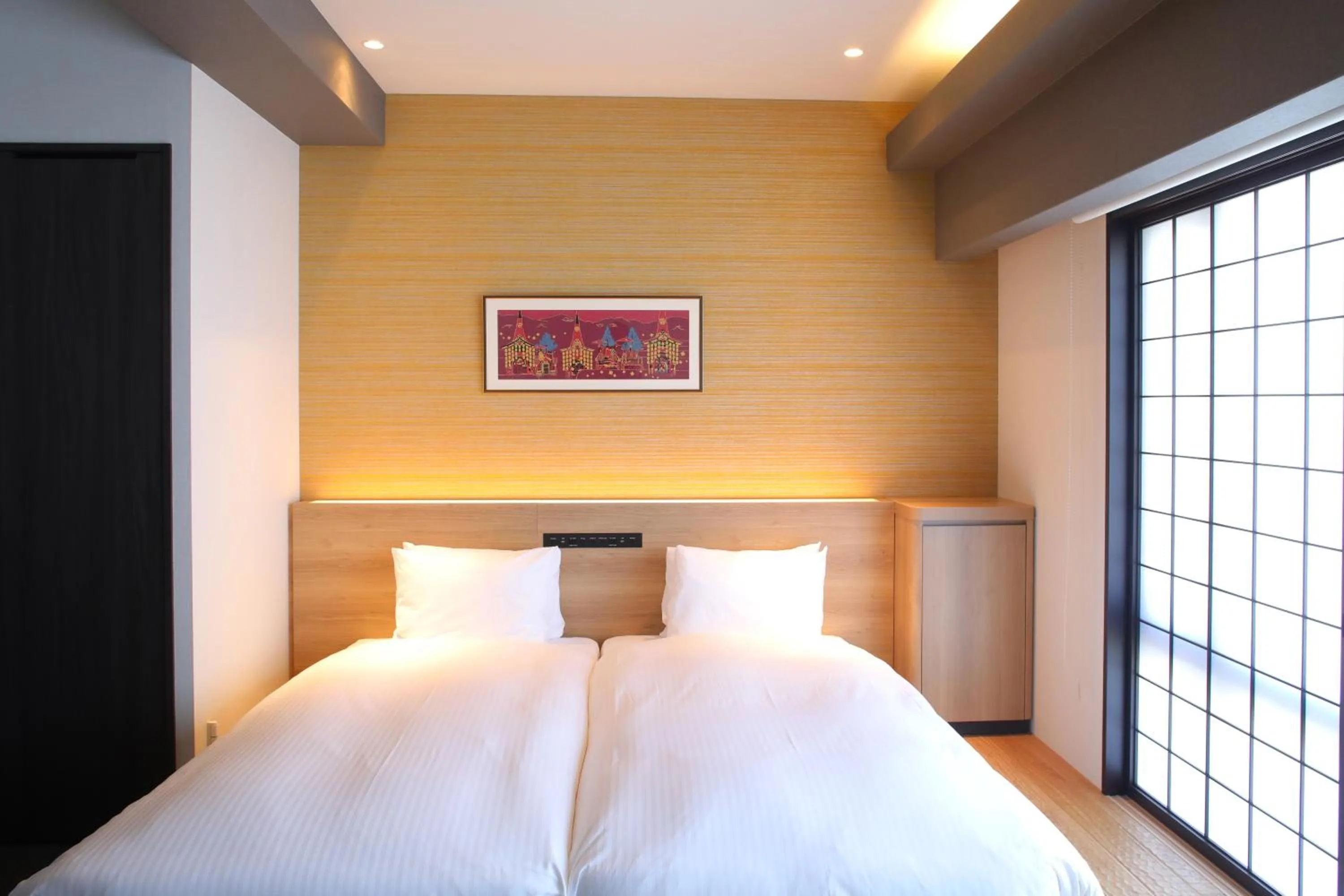 Bed in KOKO HOTEL Residence Kyoto Nijo Castle