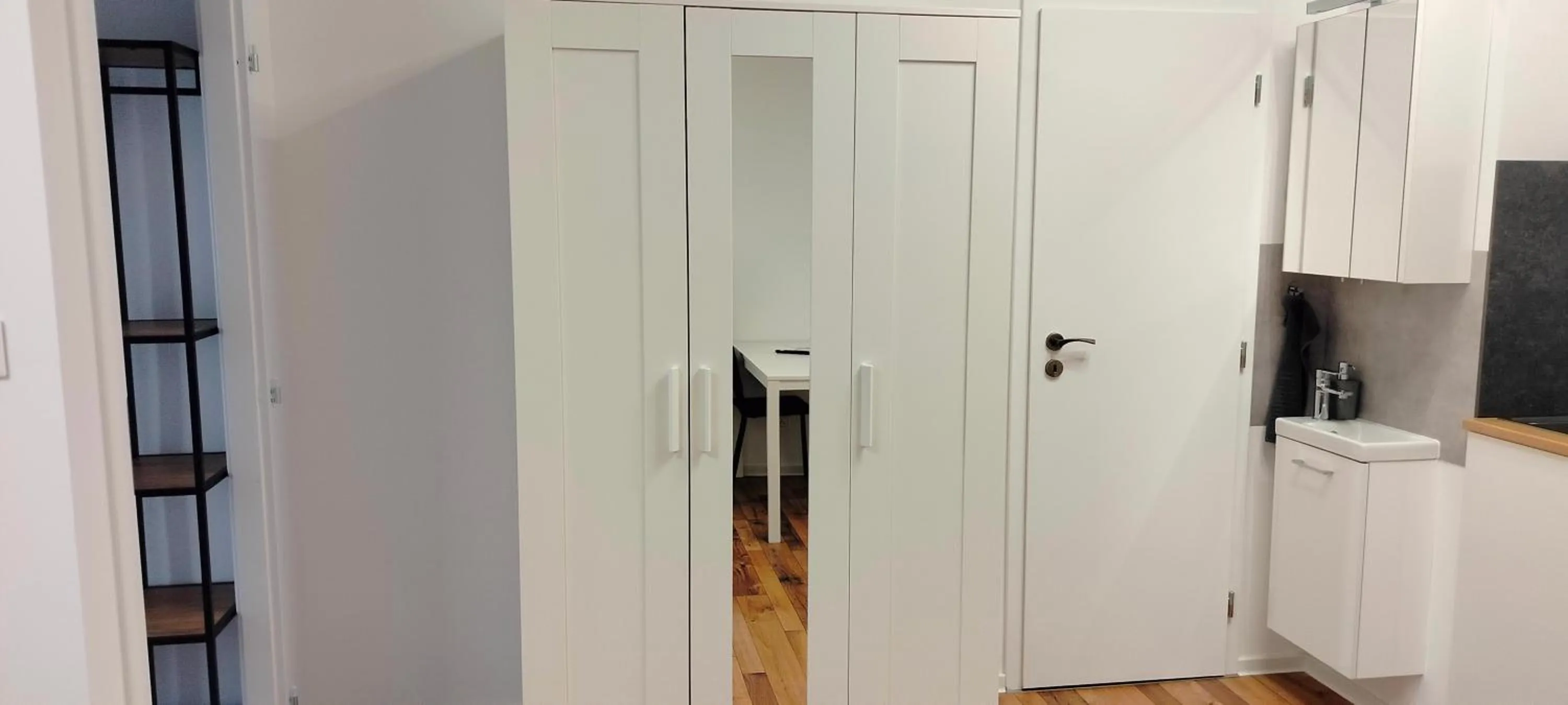 wardrobe in Dimael Hostel & Apartments