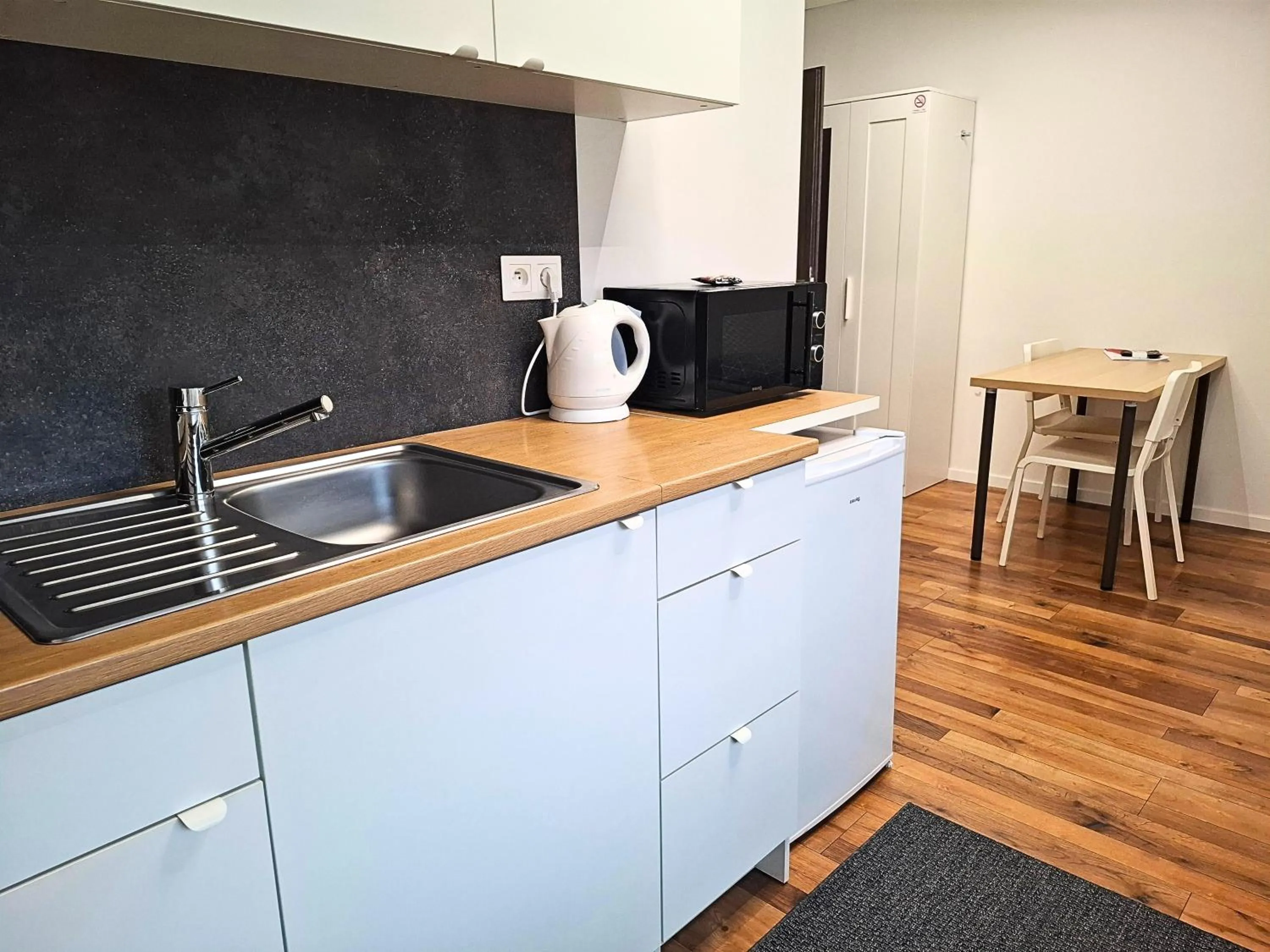 Kitchen or kitchenette in Dimael Hostel & Apartments