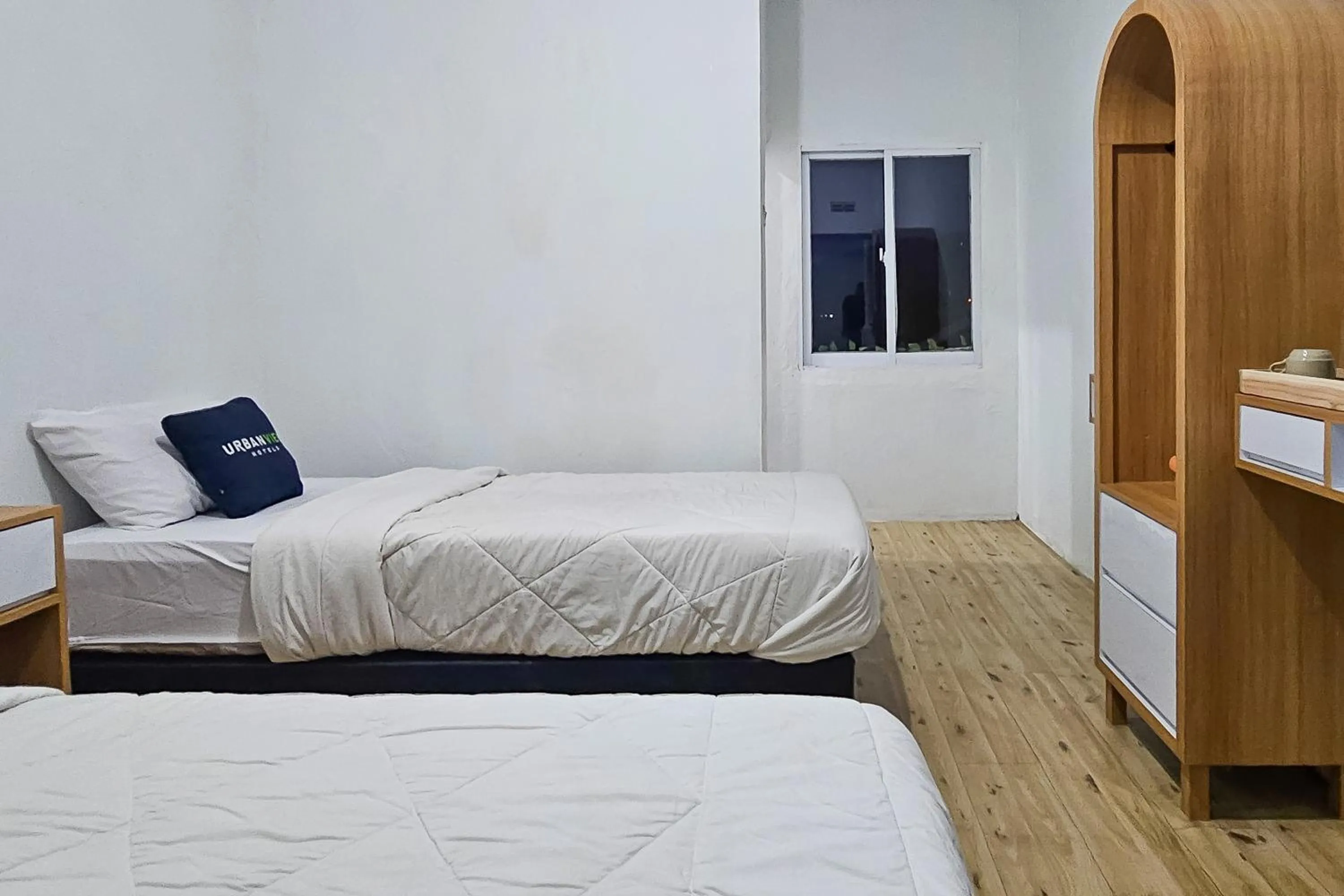 Bedroom, Bed in Urbanview Orchid Guest House