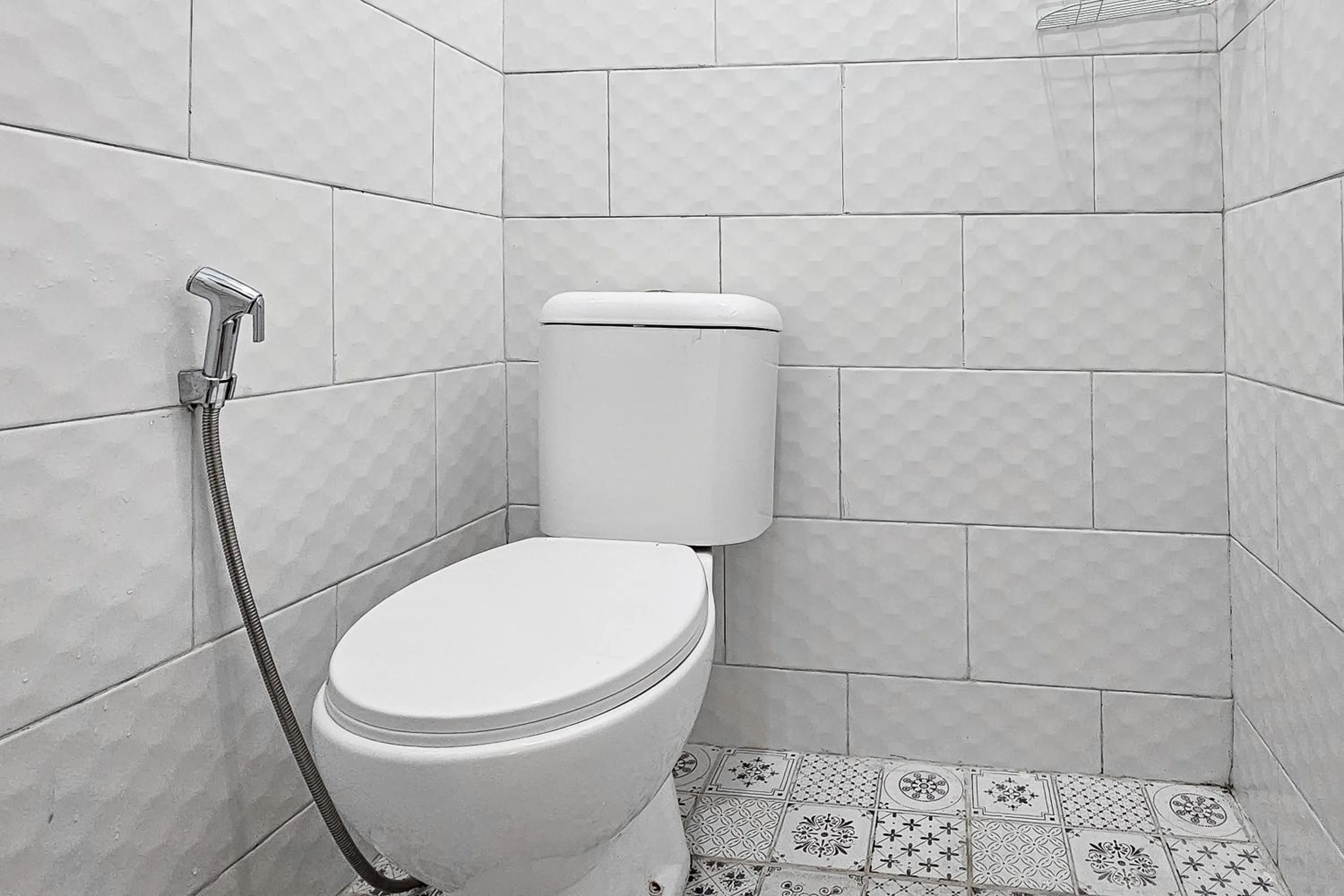 Bathroom in Urbanview Orchid Guest House