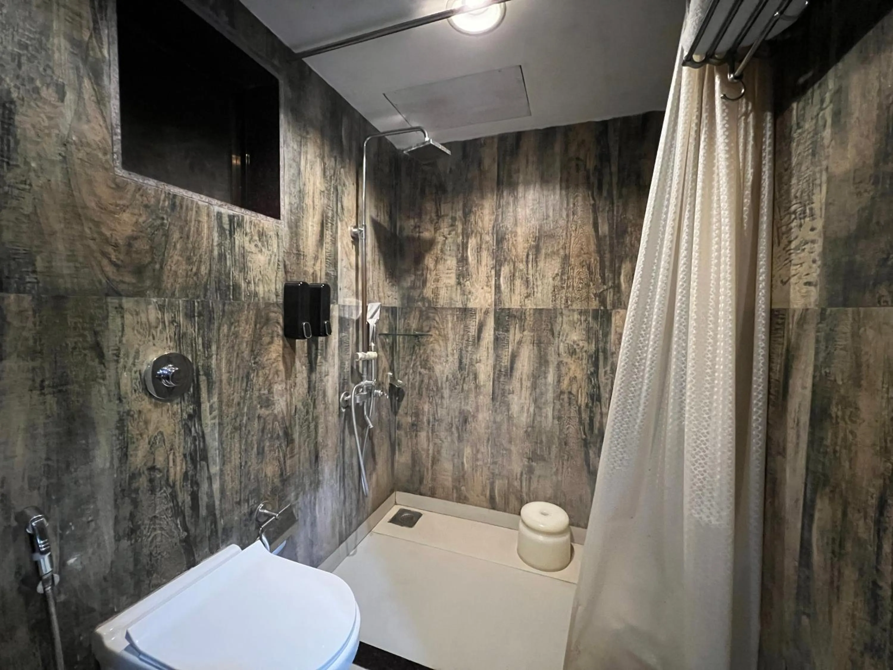 Bathroom in Aayush Resort Karjat