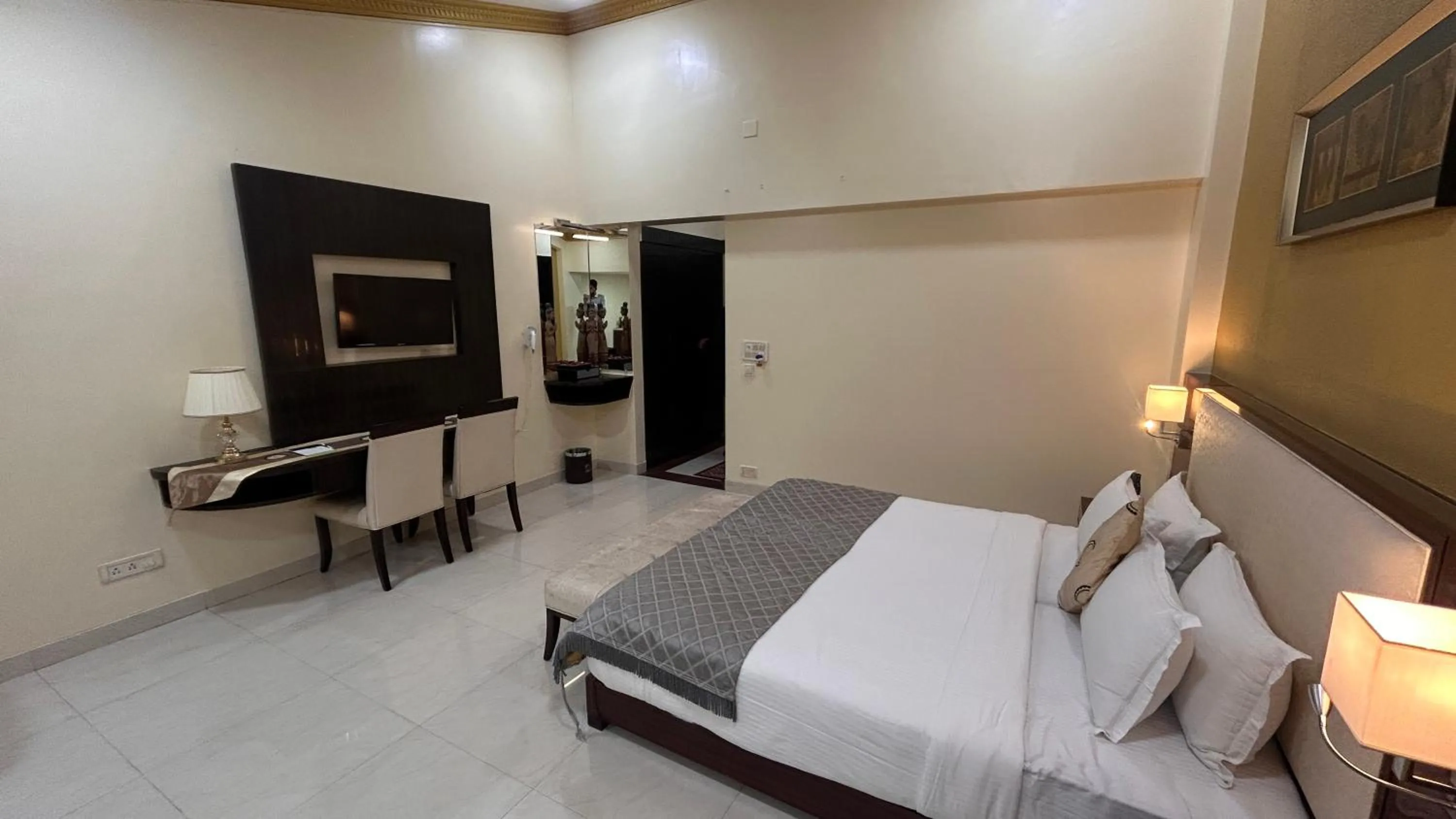 TV and multimedia, Bed in Aayush Resort Karjat