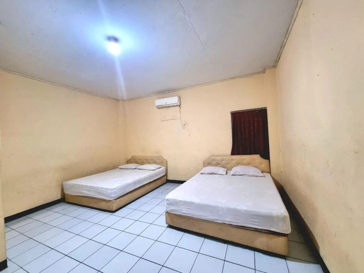 Bed in Hotel Harapan Jaya