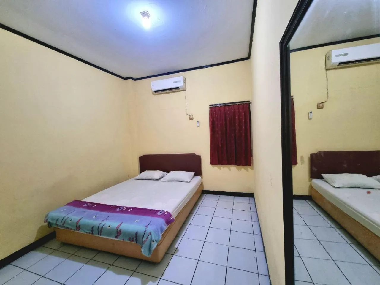 Bed in Hotel Harapan Jaya