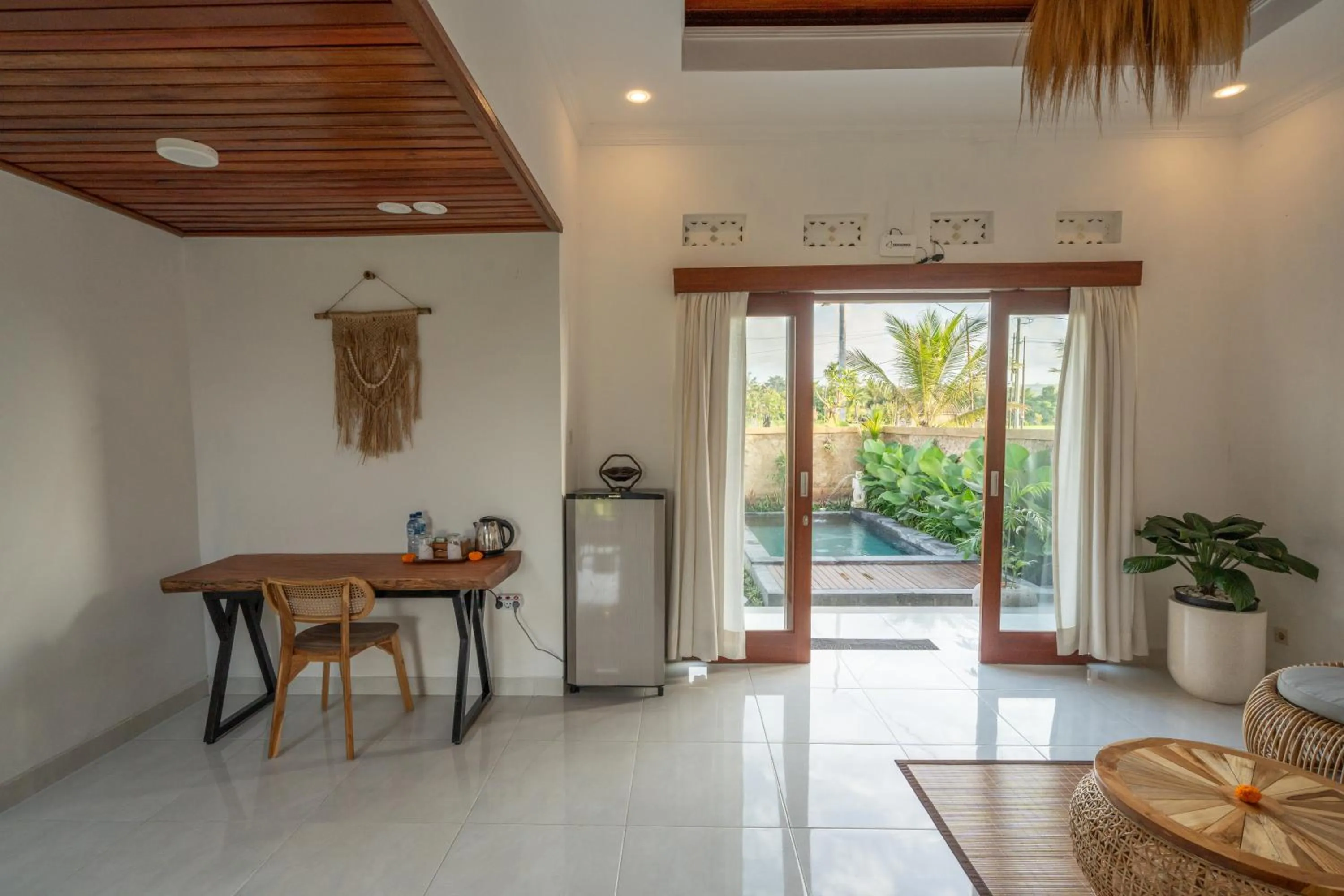 Living room in Wisana Villa Ubud by Dhananjaya Hospitality