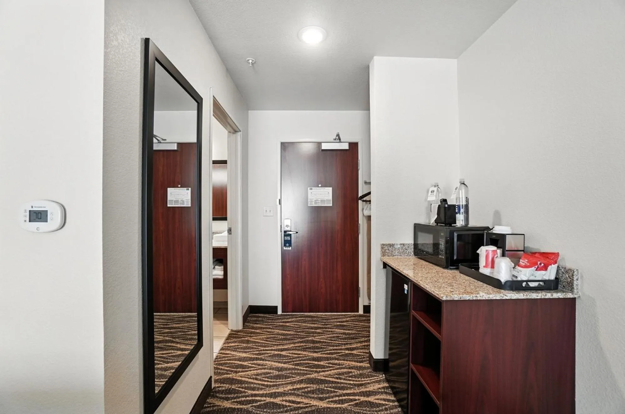 Bedroom in Cobblestone Hotel & Suites - Bellefontaine