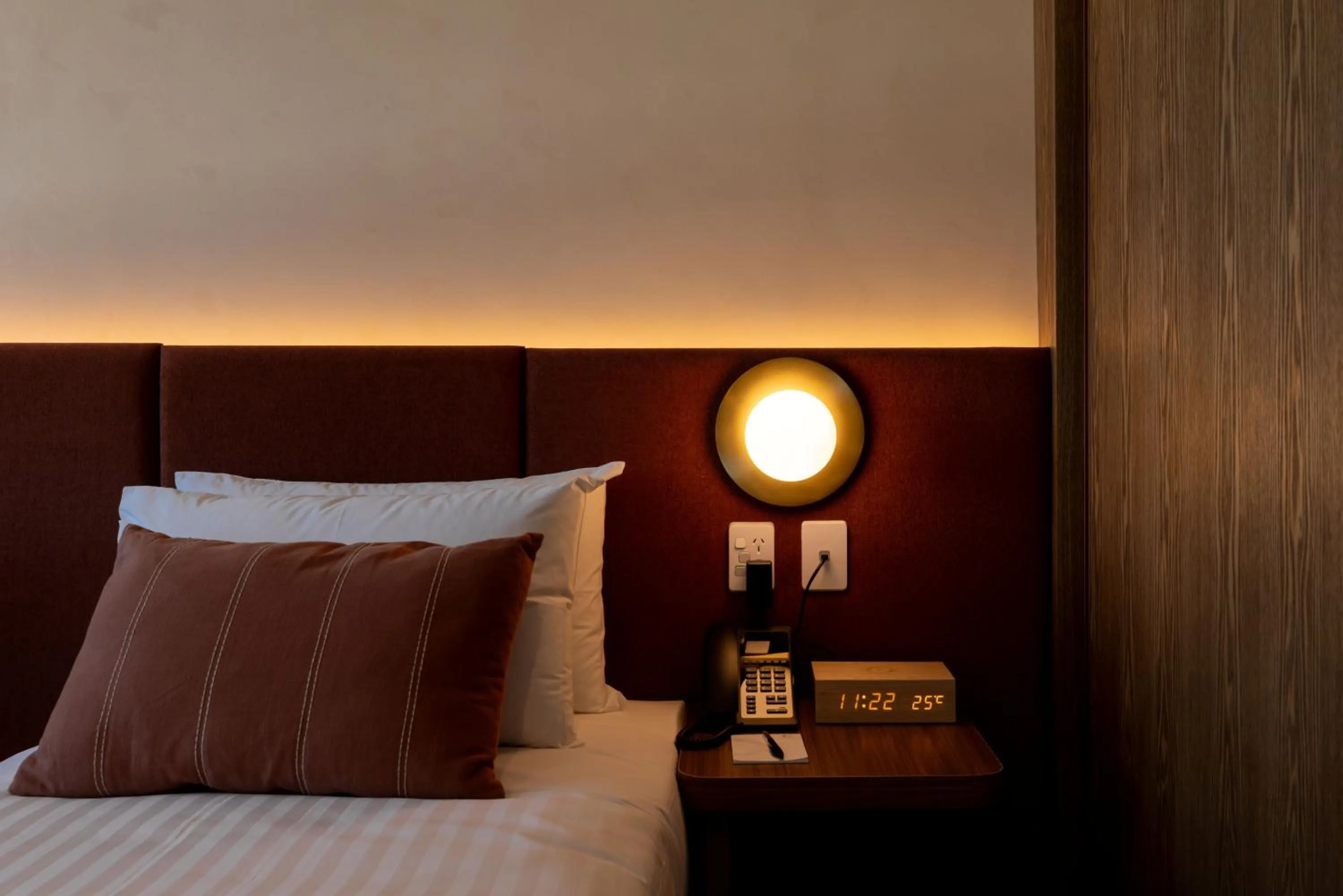 Bed in Maxim Hotel - Auckland