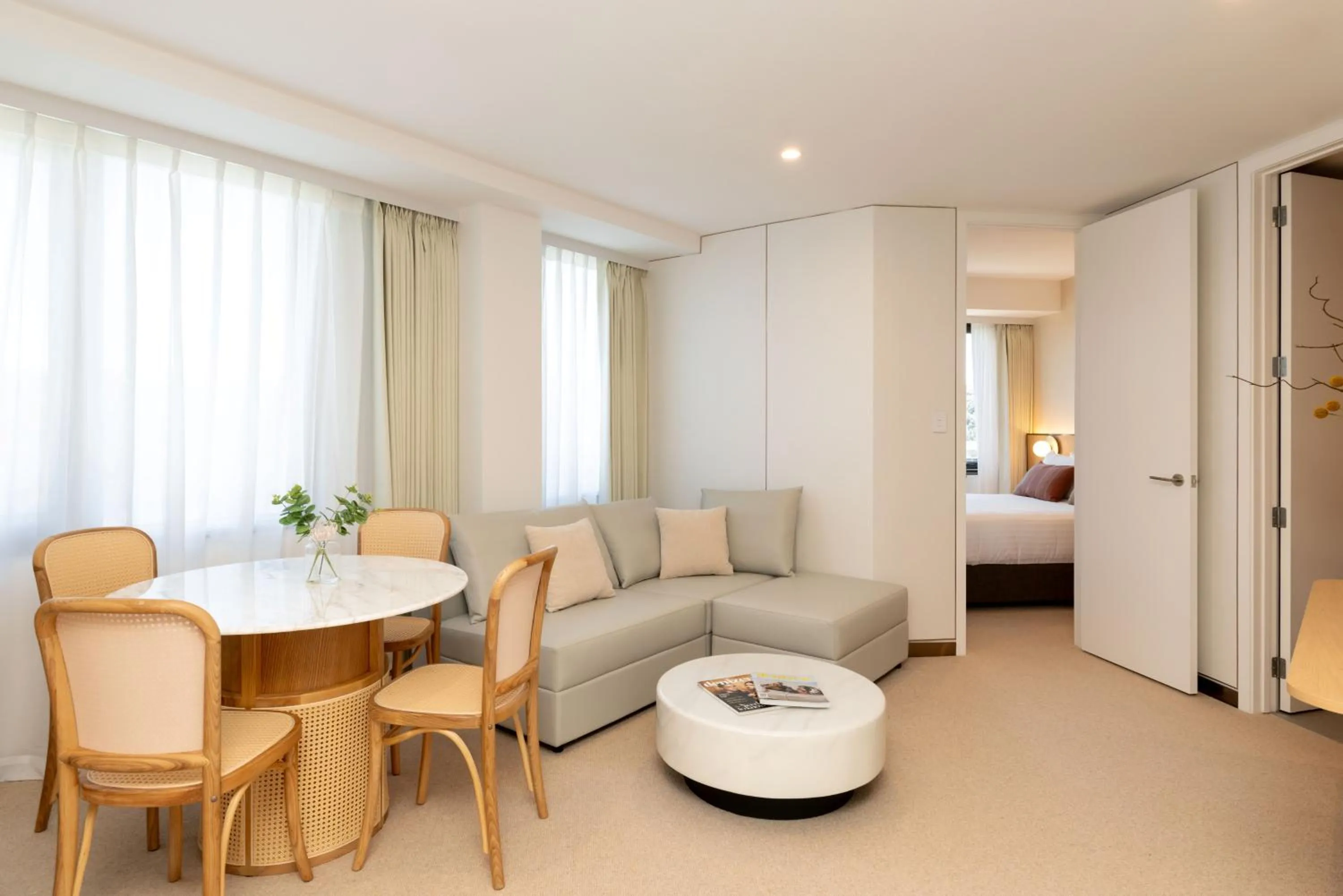 Living room, Bed in Maxim Hotel - Auckland