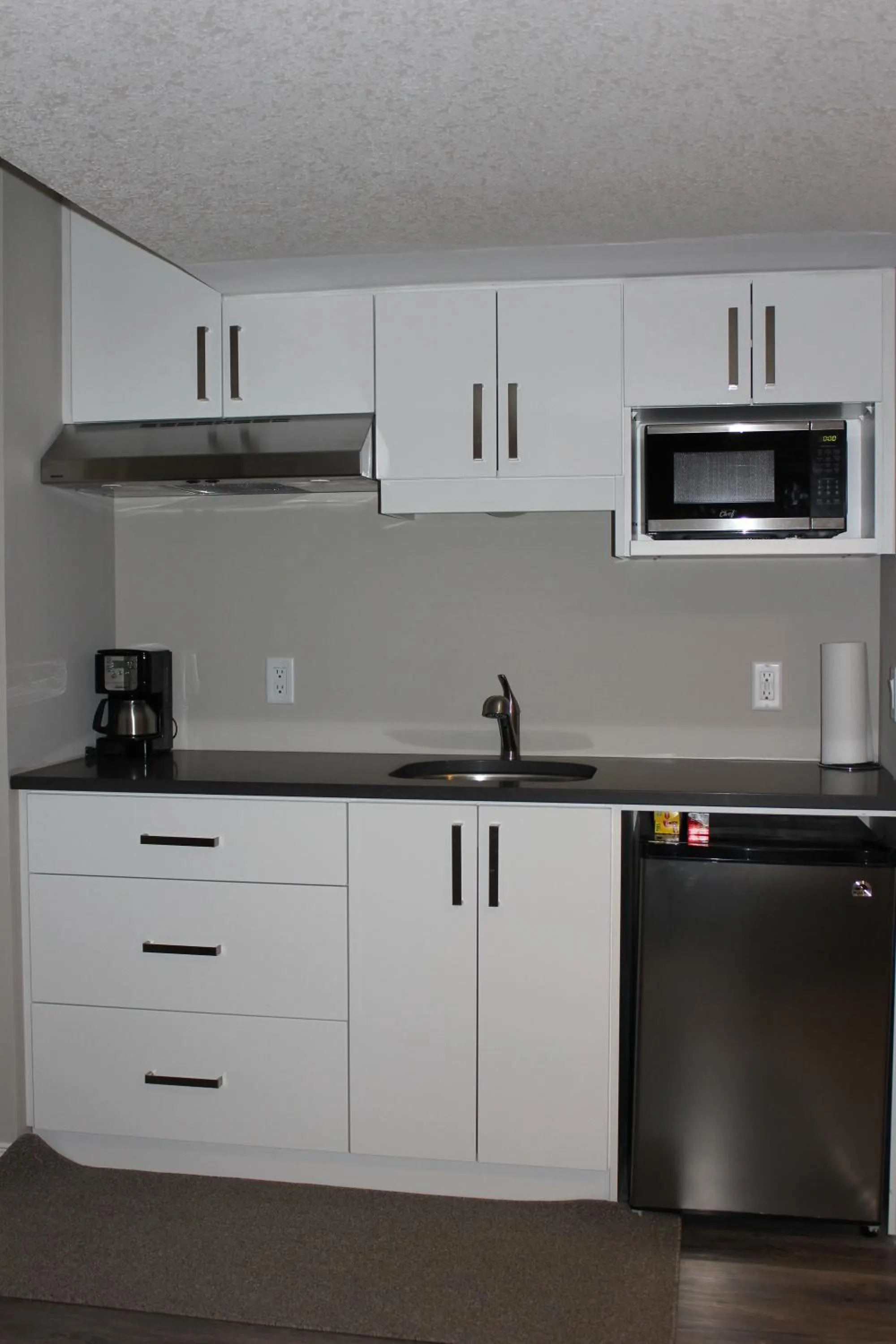 Kitchen or kitchenette in Boardwalk Homes - Executive Townhomes