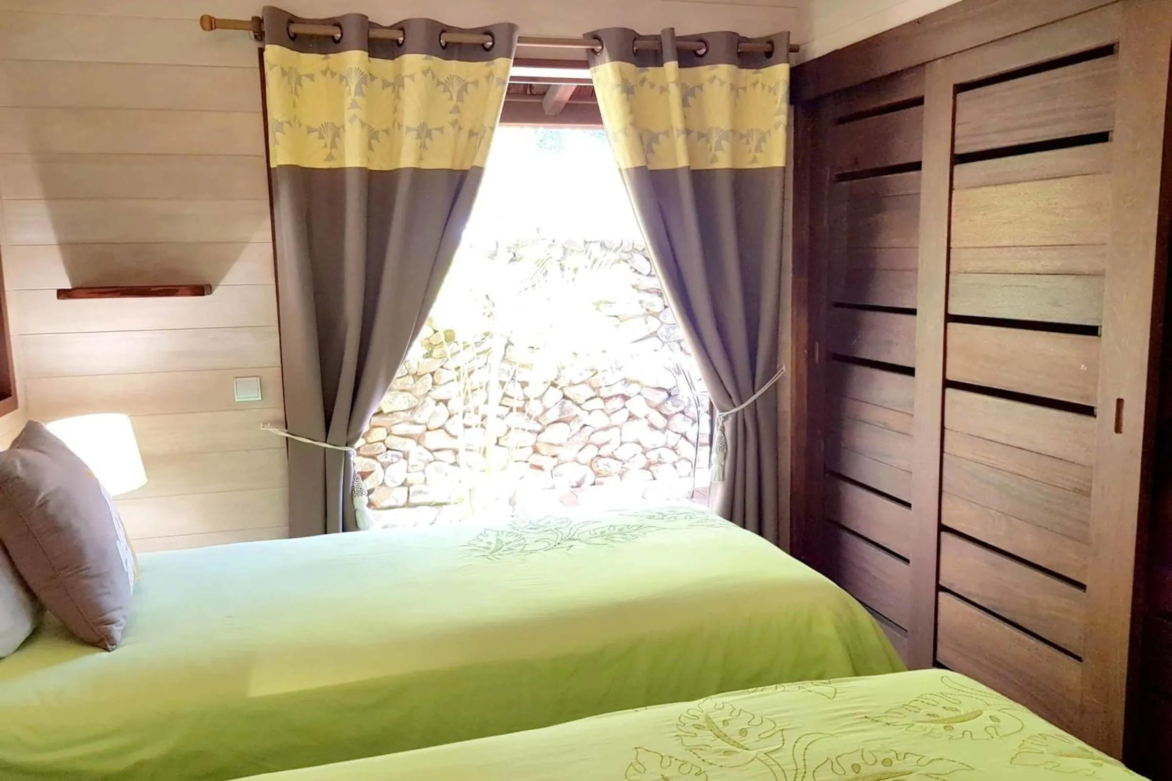 Bed in Villa Anuanua by Tahiti Homes