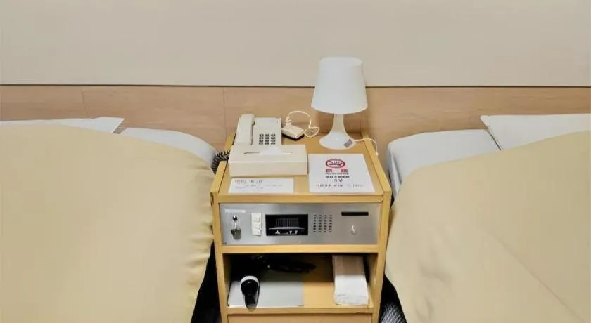 Bed in Ikebukuro Royal Hotel