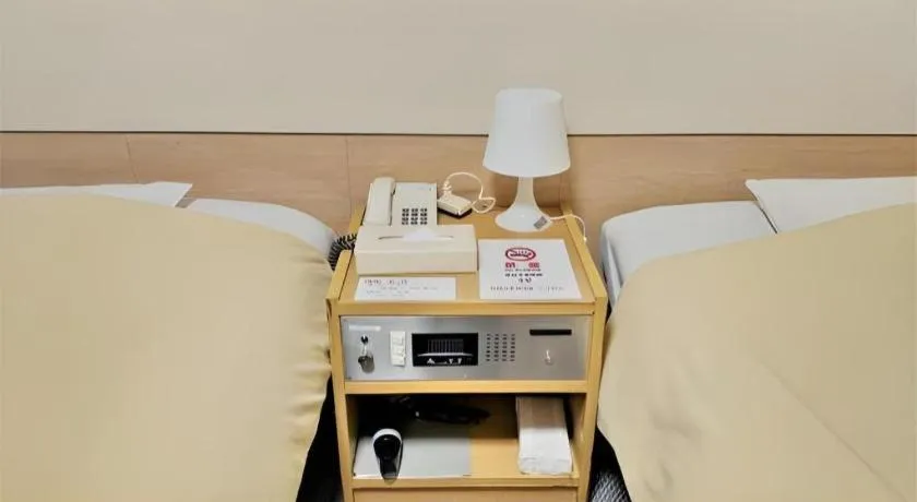 Bed in Ikebukuro Royal Hotel