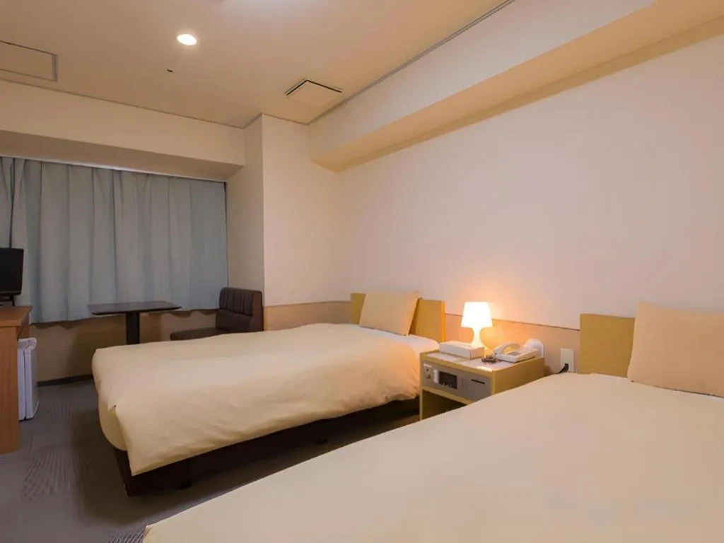 Bed in Ikebukuro Royal Hotel