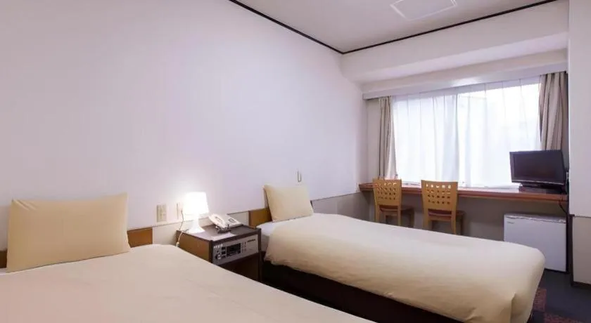 Bed in Ikebukuro Royal Hotel