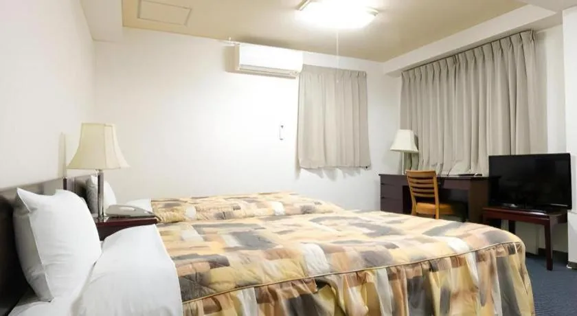 Bed in Business Hotel Shuttle