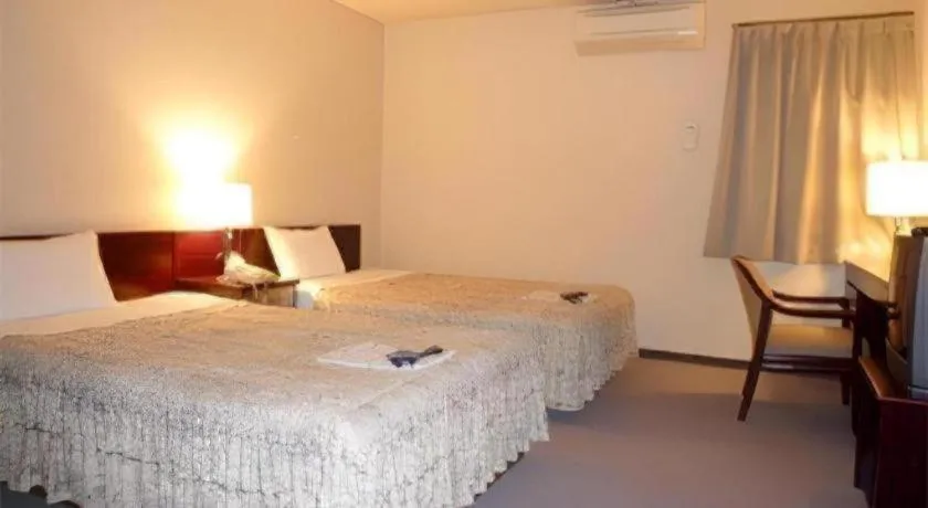 Bed in Business Hotel Shuttle