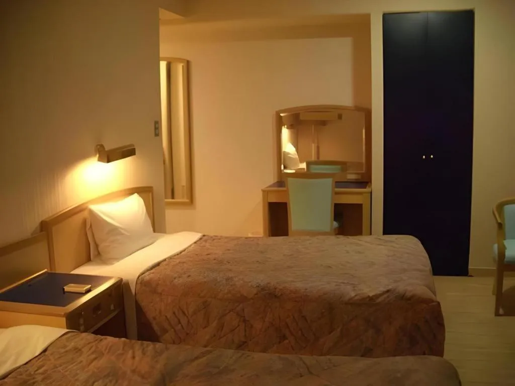 Bed in Matsuyama City Hotel