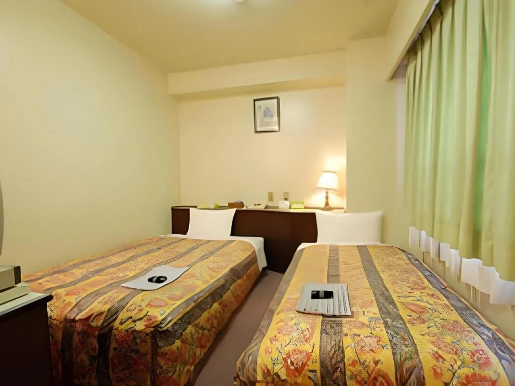 Bed in Hakata Marine Hotel