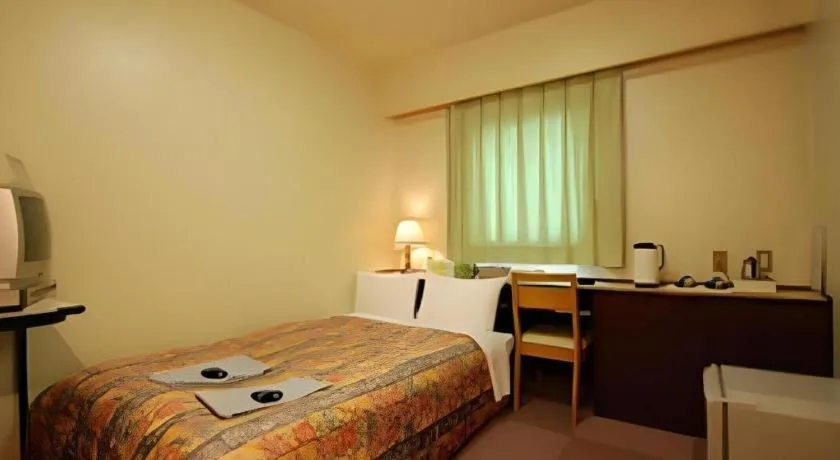 Bed in Hakata Marine Hotel