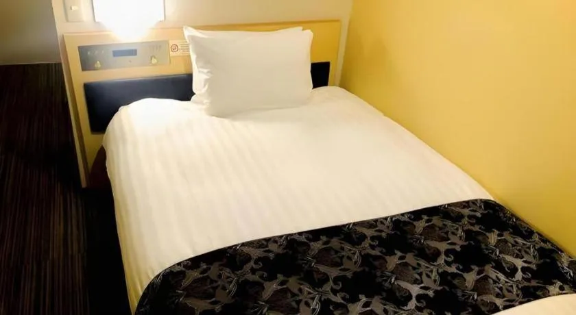 Bed in Hotel Suave Shibuya