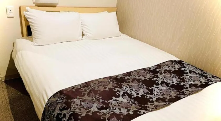 Bed in Hotel Suave Shibuya