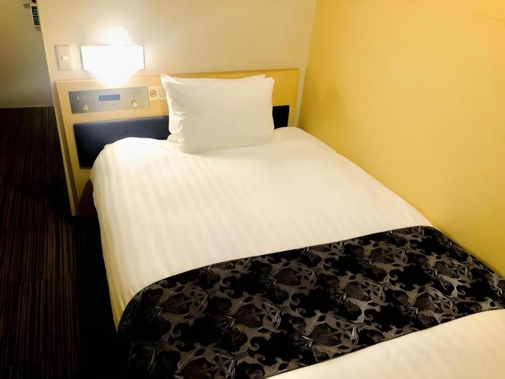 Bed in Hotel Suave Shibuya