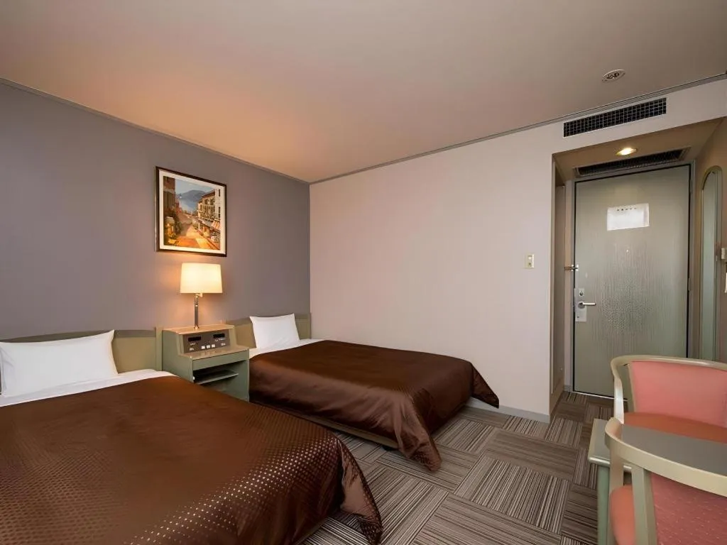 Bed in New Biwako Hotel