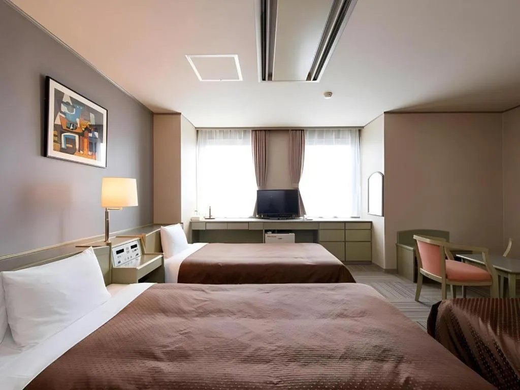 Bed in New Biwako Hotel