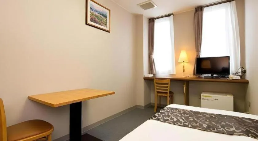 Bed in New Biwako Hotel