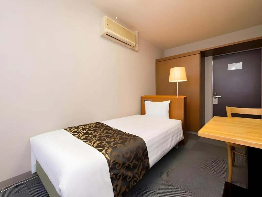 Bed in New Biwako Hotel