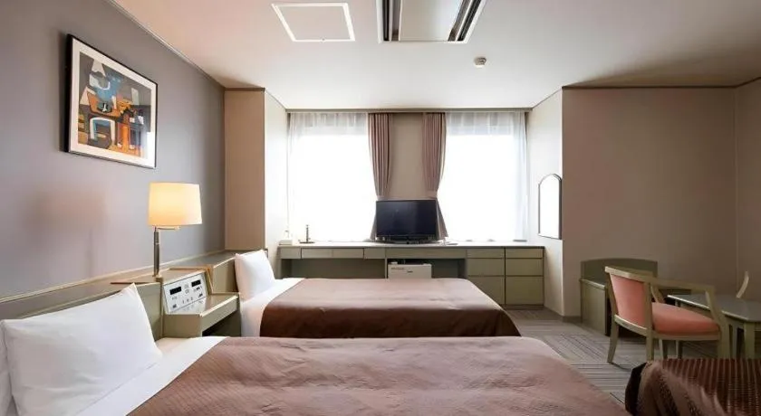 Bed in New Biwako Hotel
