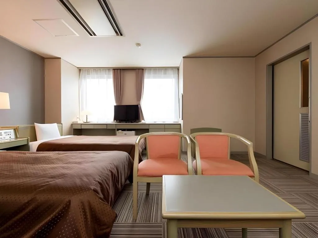 Bed in New Biwako Hotel