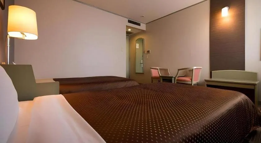 Bed in New Biwako Hotel