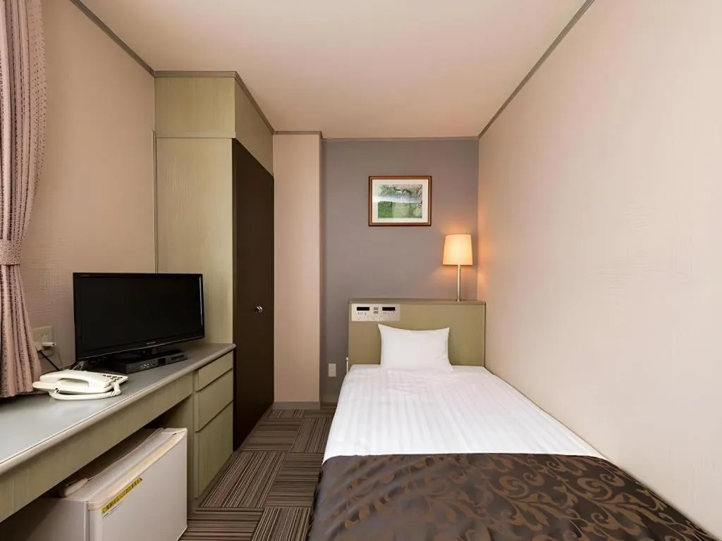 Bed in New Biwako Hotel