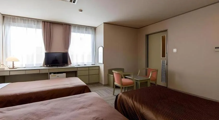 Bed in New Biwako Hotel