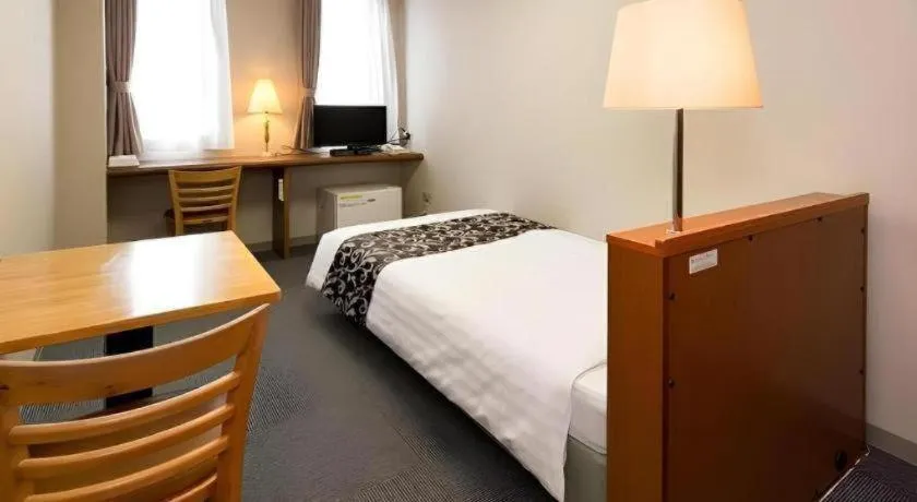 Bed in New Biwako Hotel