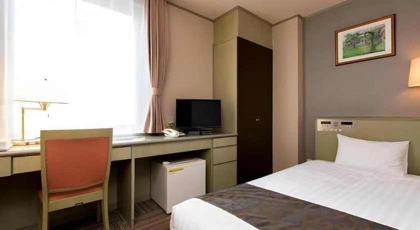 Bed in New Biwako Hotel