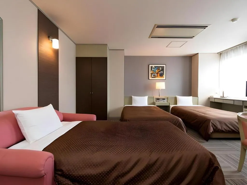 Bed in New Biwako Hotel