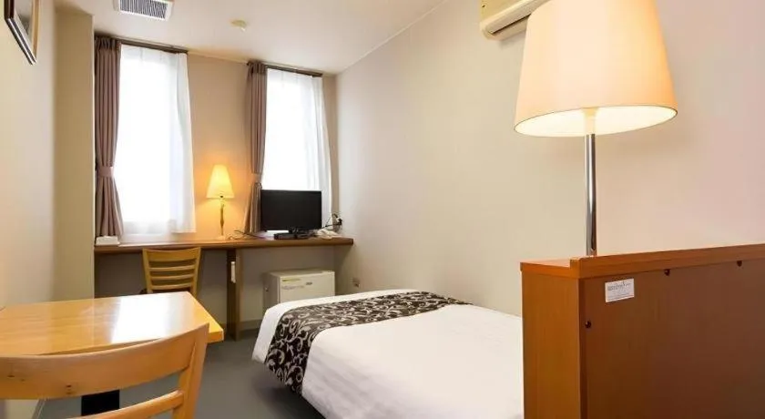 Bed in New Biwako Hotel