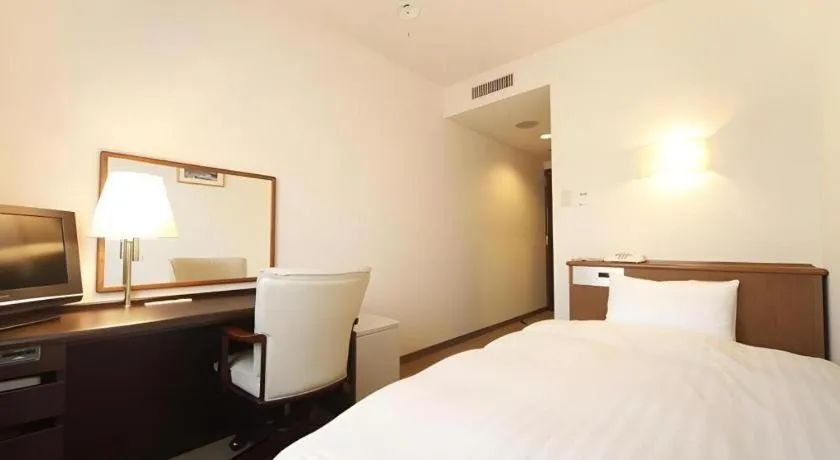 Bed in Kamisuwa Station Hotel